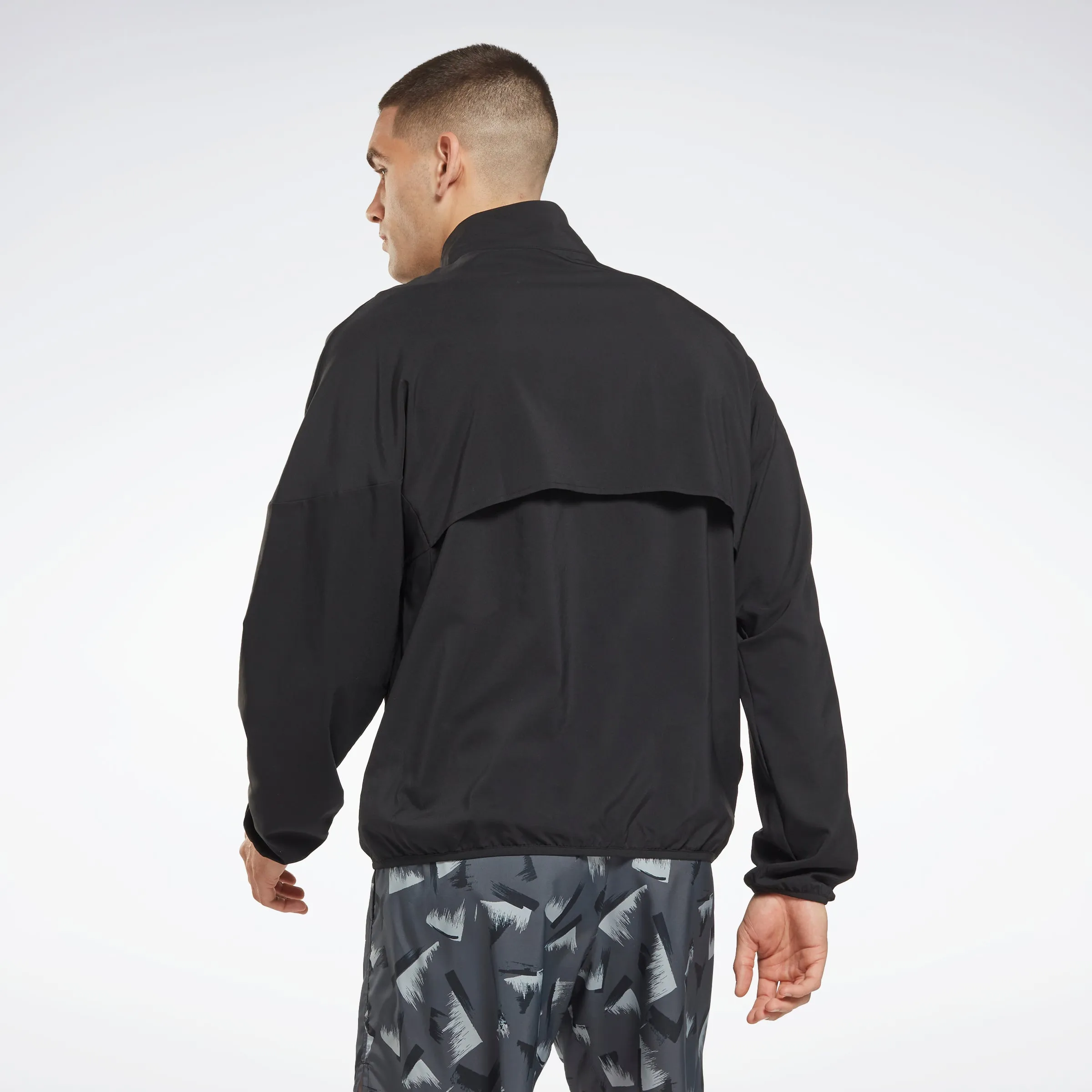 Reebok Apparel Men Running Woven Windbreaker Black