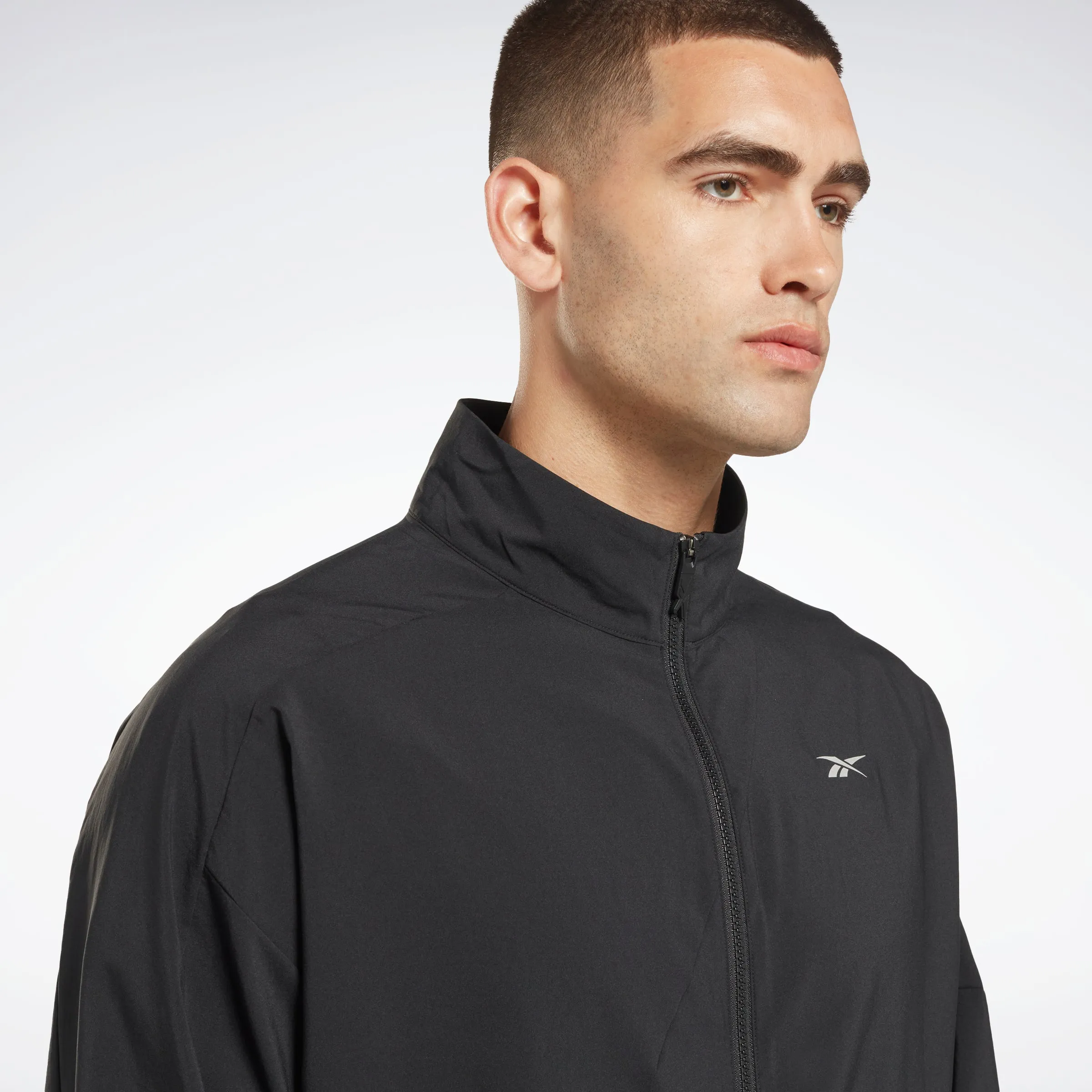 Reebok Apparel Men Running Woven Windbreaker Black